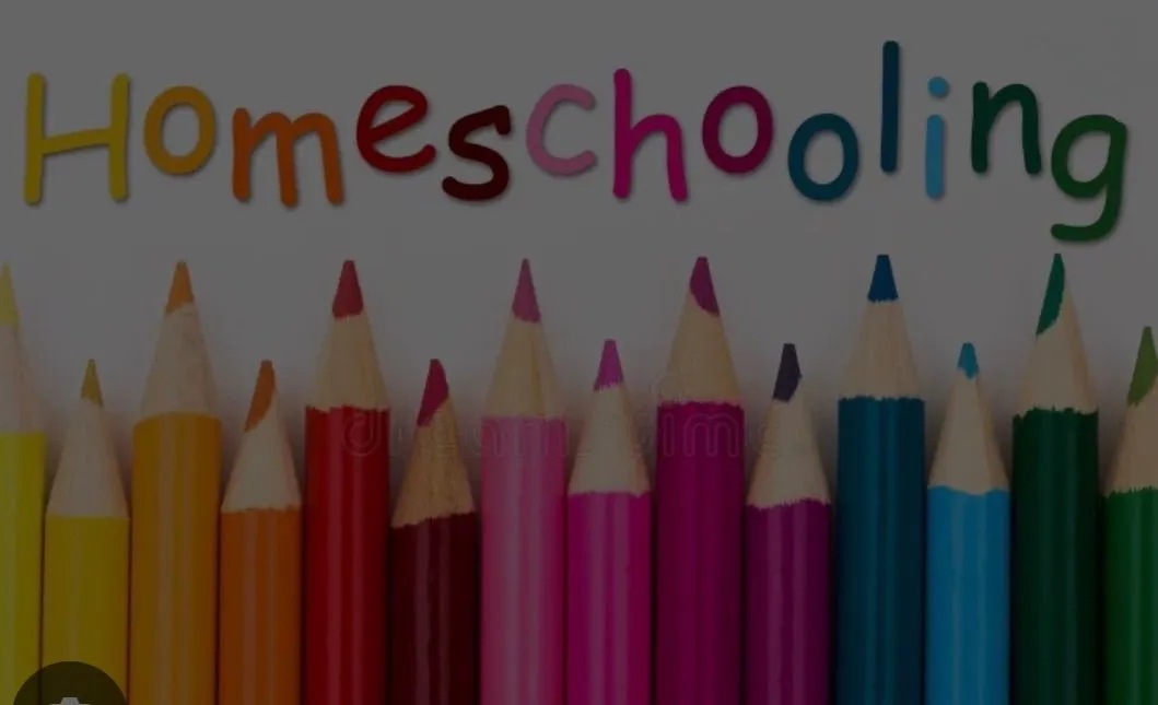 Colourful pencils beneath a homeschooling sign