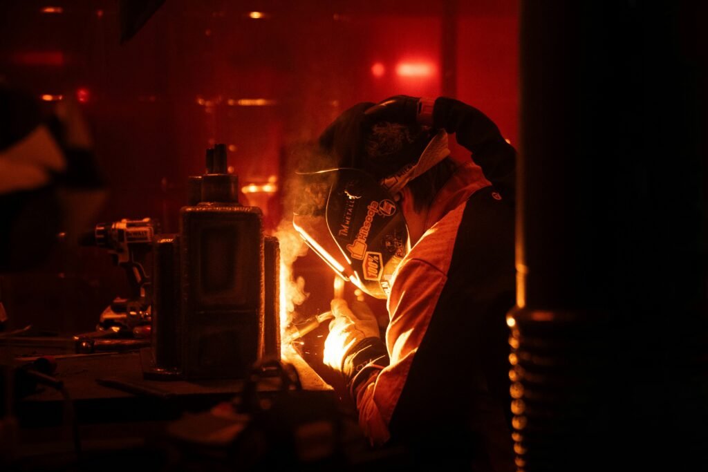 Employees completing workplace fire safety and hot works training in a UK business environment