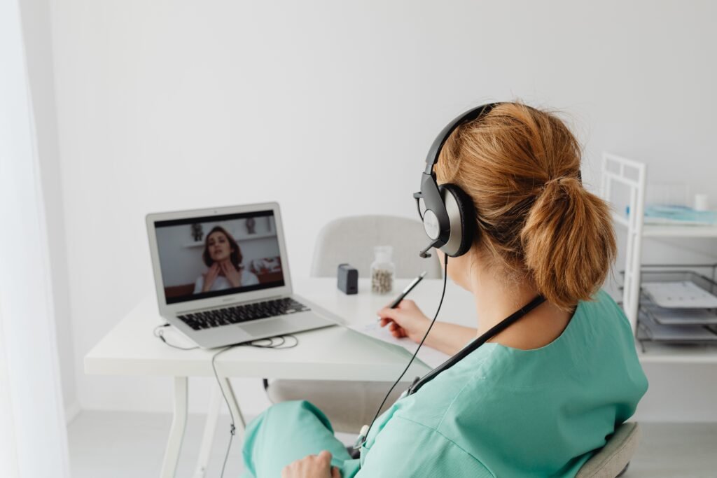 Care staff completing accredited online health and social care training courses in the UK